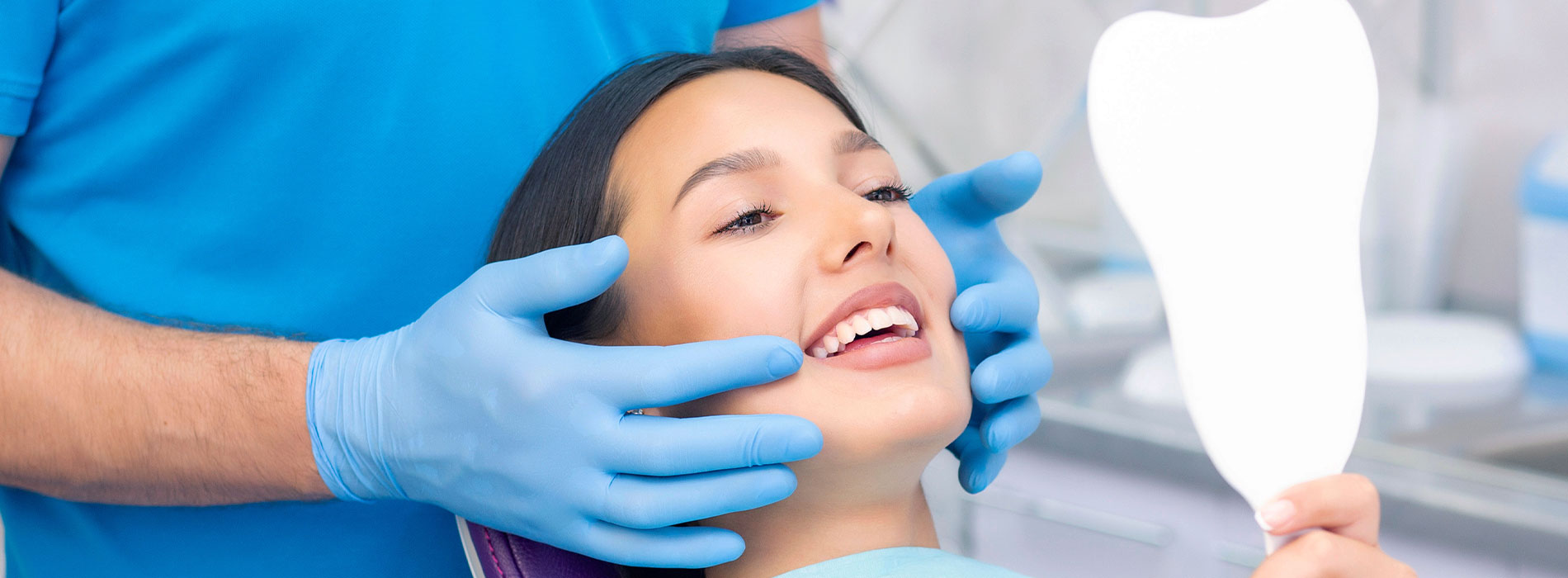 This is a composite image showing medical equipment and supplies, including a stethoscope, blood pressure cuff, tongue depressors, and other instruments, arranged in a manner that suggests they are part of a medical examination or procedure. The background is a solid color to emphasize the items.